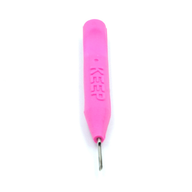 Close-up of a magenta KEEP placer, showing the KEEP embossing on the handle and the steel tip.
